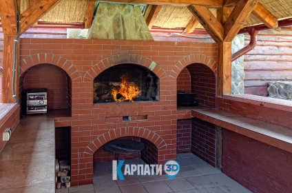 Котедж на березі озера, мангал